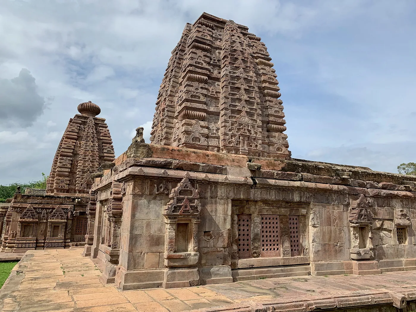 The carved stone shikharas of the Navabrahma temples at Alampur, near Gadwal