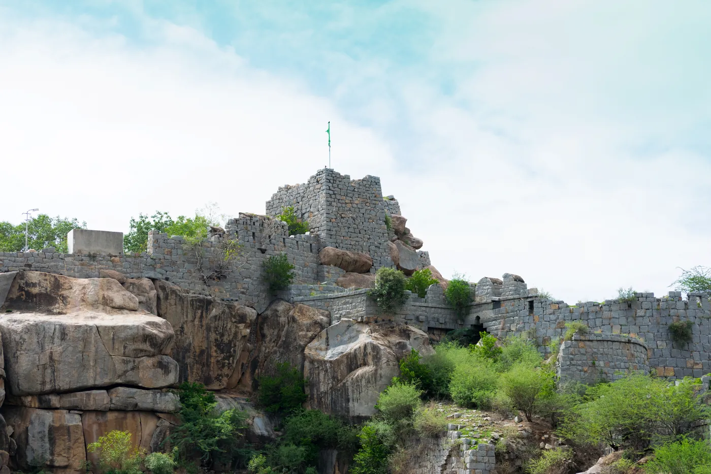 The stone ramparts of Raichur Fort on its granite hill, Raichur